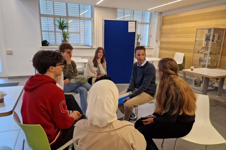 Anthony together with students