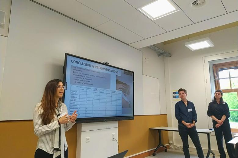 students presenting in a classroom