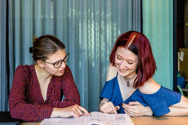 Two female students studying together