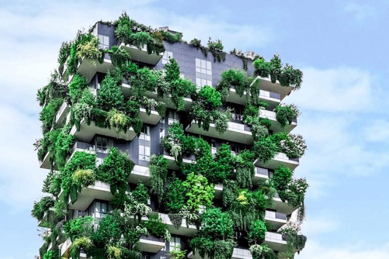 High building with plants growing from the facade