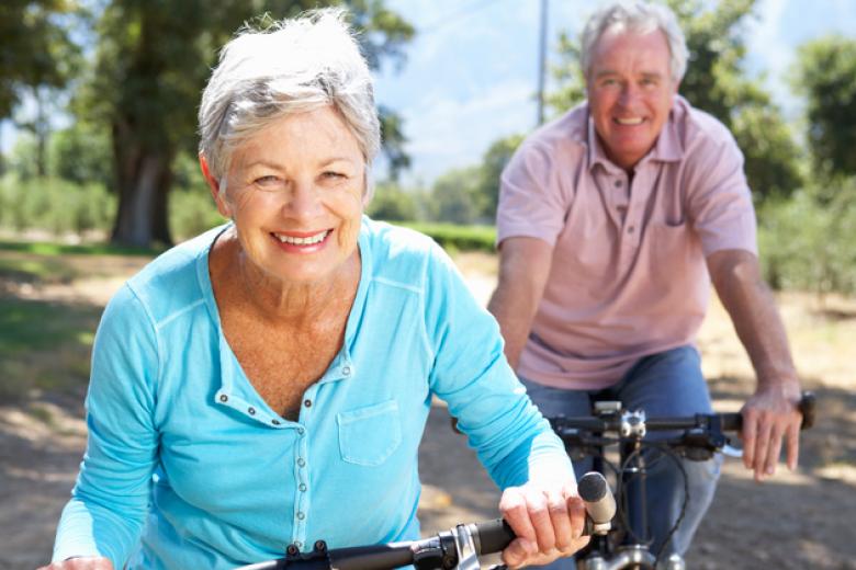 seniors riding a bike