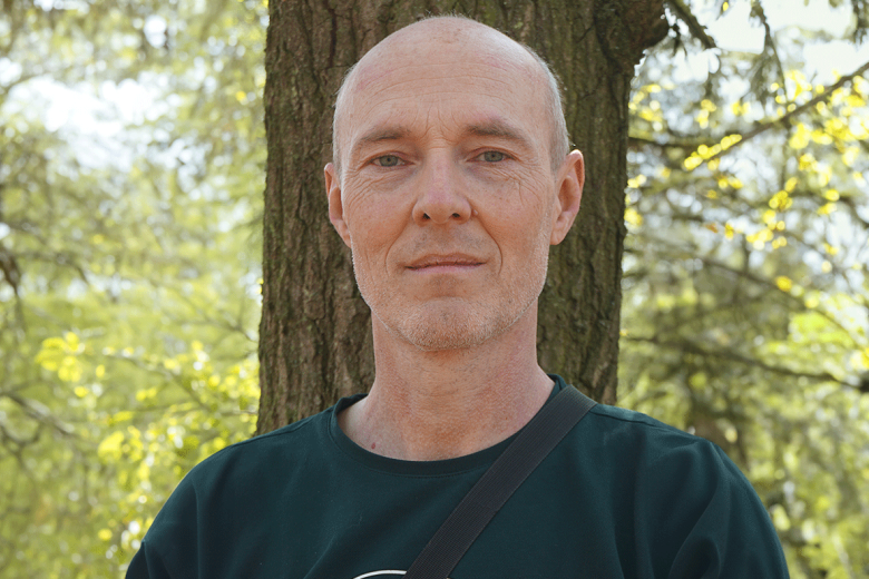 Man standing in the forest