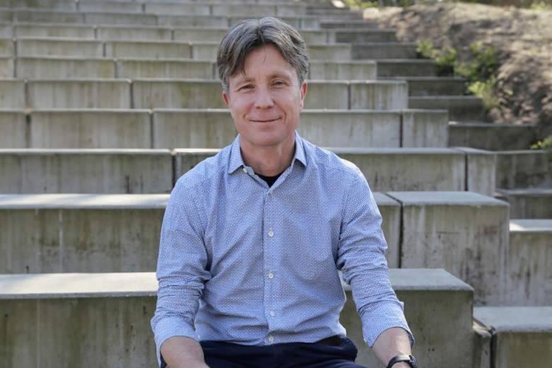 Pim Martens on concrete stairs