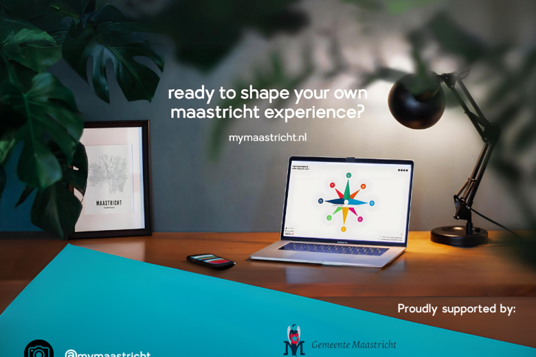 A desk with a laptop placed on it displaying the screen with the mymaastricht website homepage on it. There is also a framed photo of a drawing of Maastricht and a lamp shining. There are green plants around the edges. The bottom contains the name of the mymaastricht instagram and email address. Follow us on instagram @mymaastricht and email us any questions you might have at info@mymaastricht.nl. We are proudly supported by the Gemeente Maastricht, Maastricht University and ZUYD Hogeschool.
