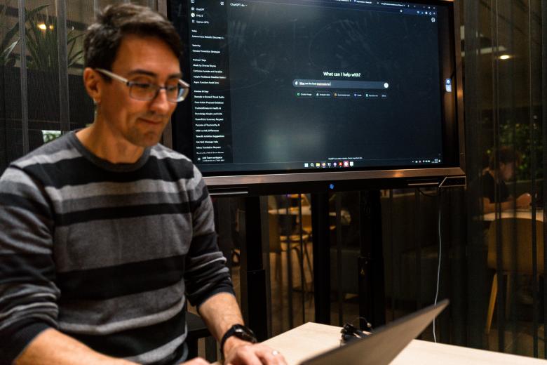 Michel Dumontier working on his laptop