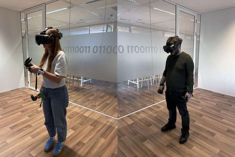 Two volunteers wearing a virtual reality headset during an experiment