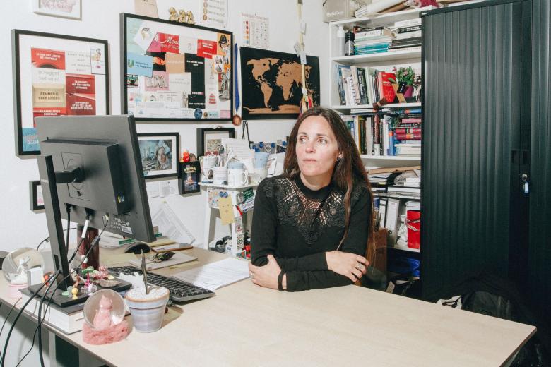 Kim Kuypers at her desk
