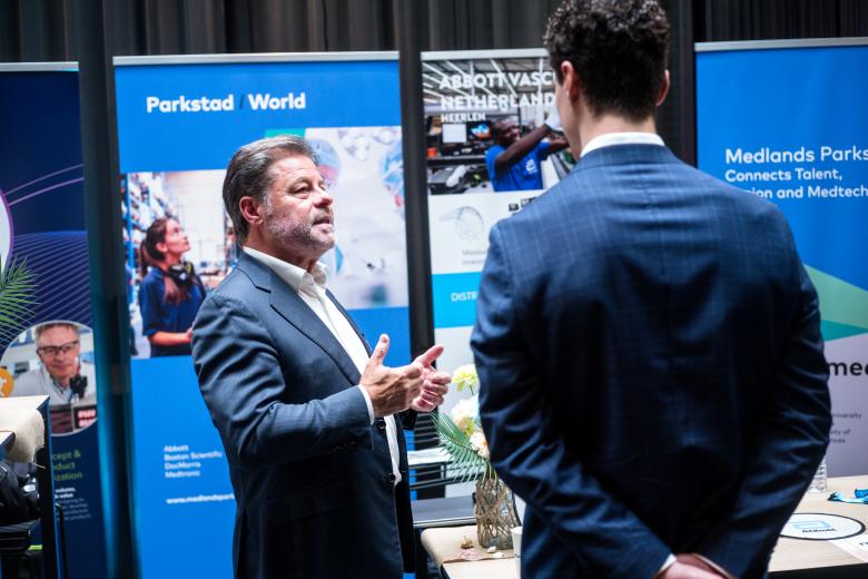 People talking at event