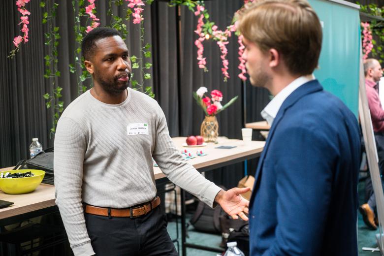 People talking at event
