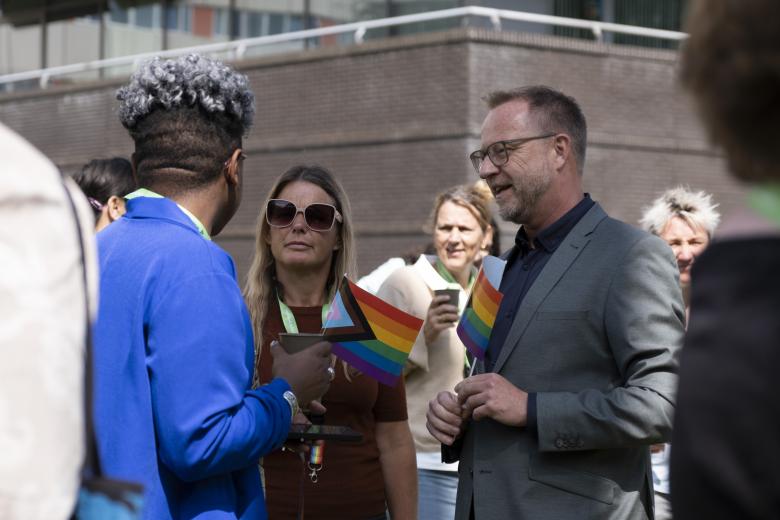 Vice President Jan-Tjitte Meindersma speaks to staff and students at Pride month flag raising event