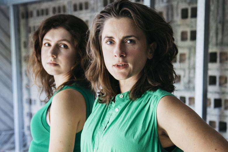 Dani and Valentina looking into camera