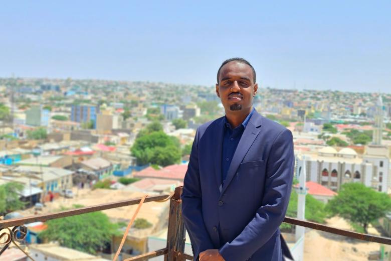 Guleid Ahmed Jama on a balcony
