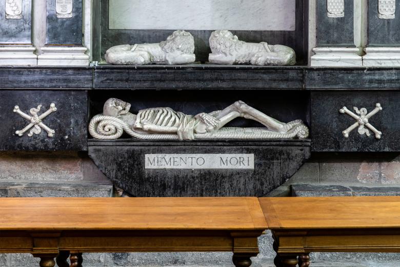 Memento Mori sculptures at a church altar