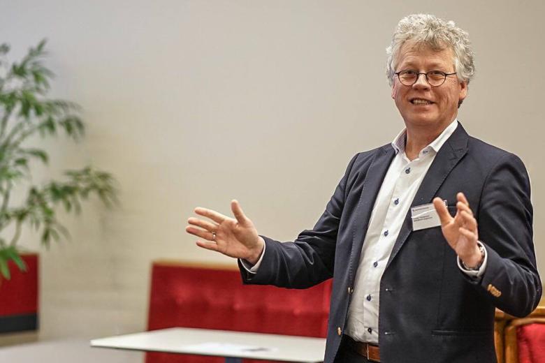 Frank Thuijsman smiling while talking