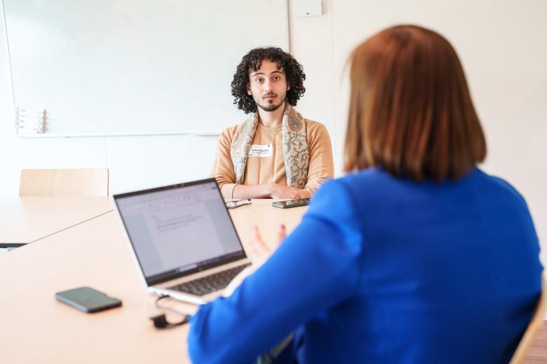 man talking to woman