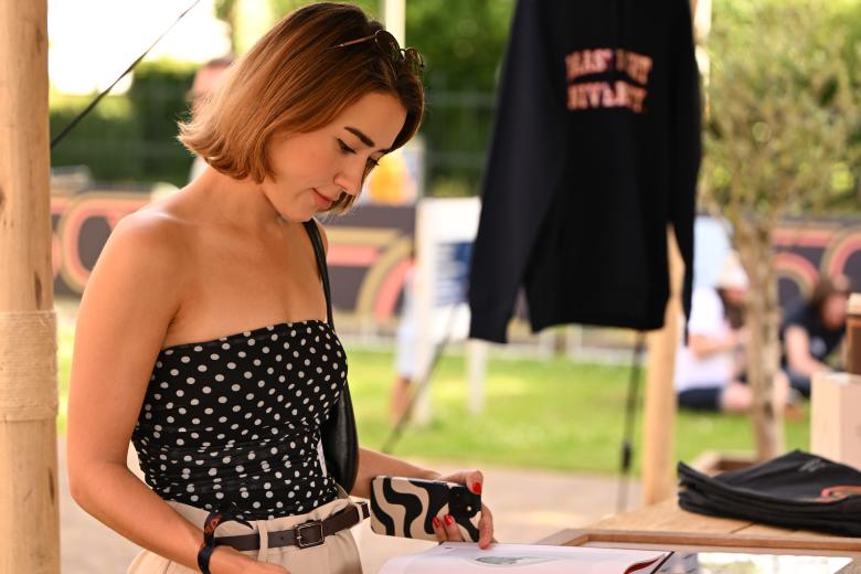 Merch stand at the UM50 Homecoming