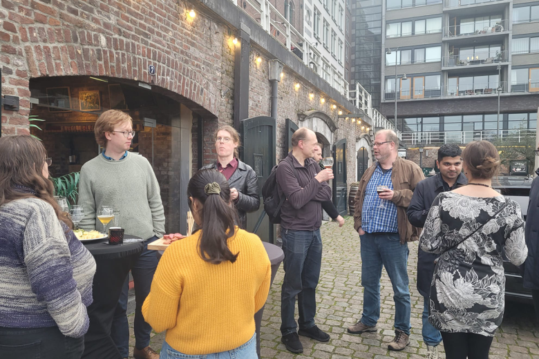 People having a drink at social gathering