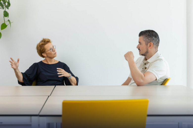 Two people talking